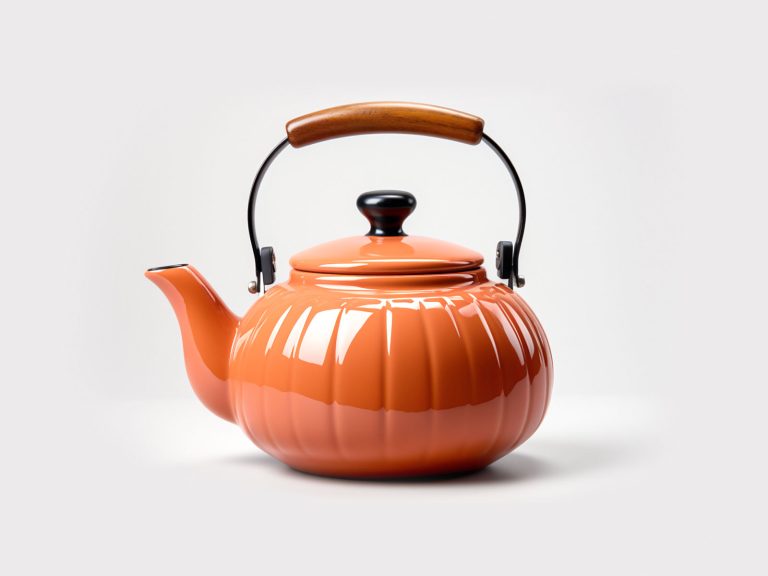 Ceramic kettle on white background